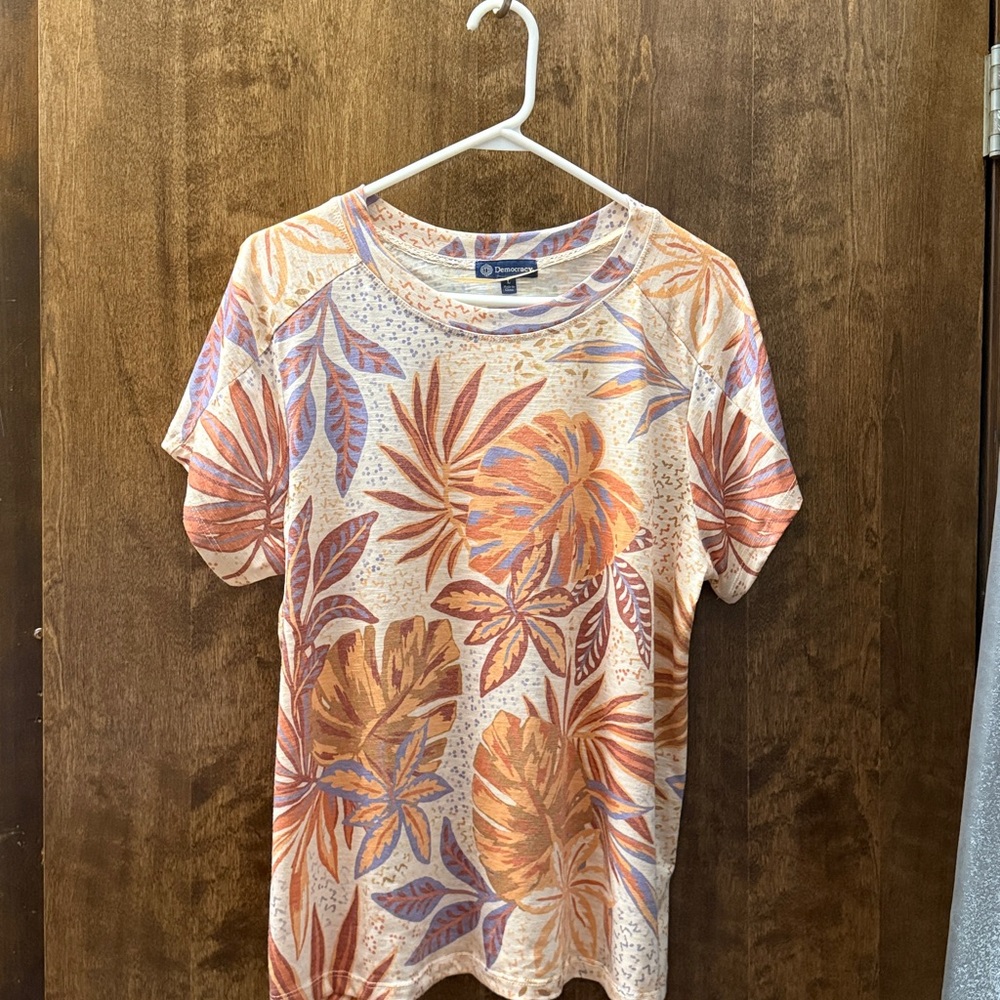 Democracy Tropical Leaf women’s T-shirt Cream, Rust and Blue.